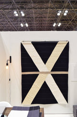 Louise Gray Quilt No. 6 with bold charcoal and khaki geometric X design.