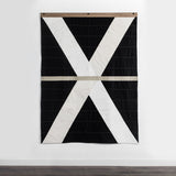 Louise Gray Quilt No. 1 handmade cotton textile with bold black, white, and tan geometric X pattern.