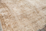 Blanched vintage Oushak rug with faded wheat tones and subtle drawing.
