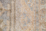 Faded ivory, beige, and silver pile with bronze geometric motifs on a vintage Oushak carpet.