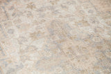 Soft, blanched Oushak carpet pile reveals subtle pattern in ivory, beige, lavender hues.