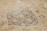 Faded Polonaise-inspired pattern and soft earth-tones with subtle mint green on vintage Oushak rug.