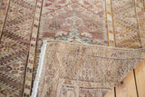 Hand-knotted foundation and lilac, brown pile of the 1940s vintage Anatolian rug.