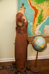 Flowing skirt with unique hem of the vintage brown Dorothy O'Hara evening gown.