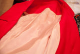 Smooth, silky pale pink lining inside the vintage 60s hot pink dress coat.