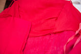 Interior seam detail of the vibrant hot pink 1960s dress and coat suit.