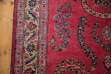 Intricate floral border and intact side cord of a vintage Persian Meshed runner.