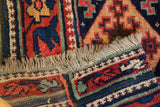 Intricate pawn motif border, original fringe, and foundation of an antique Kurdish saddlebag rug.