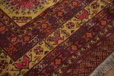 Dense wool pile and original ivory fringe on the corner of a vintage Daulatabad carpet.