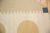 Abstract rectilinear and curved patterns in ivory, beige, and dark denim on contemporary Kilim.