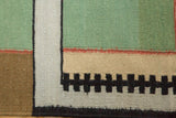 Flatweave geometric track trail and block pattern on a vintage Contemporary Kilim.