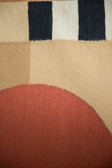 Handwoven texture and abstract cinnabar, beige, and charcoal black design of the Vintage Contemporary Kilim.