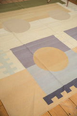 Handwoven contemporary Kilim flat weave with abstract beige circle and violet geometric block.