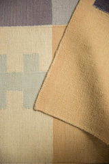 Handwoven contemporary Kilim flatweave, showing beige blocks, original side selvage, and backside.