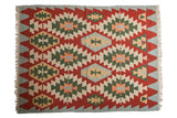Vintage Turkish Kilim rug, repeating serrated medallions in terracotta, mallard green, ivory, powder blue.