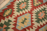 Serrated multi-medallion motif in mallard green, powder blue, ivory, and blush on vintage Turkish Kilim.