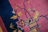 Sprawling Art Deco vase and floral design in faded raspberry pink and cobalt blue.