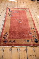 The lustrous copper pile of a vintage Art Deco Nichols runner with delicate floral motifs.