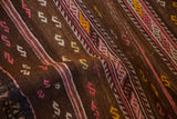 Textured hand woven Jijim runner with coffee brown ground, pink, blush, saffron serpent, geometric patterns.