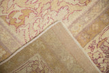 Tightly woven foundation and secured side of a hand-knotted antique Indian Agra rug.