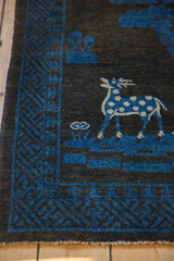 Charcoal ground vintage Peking rug, spotted deer with tongue out, cobalt blue border.