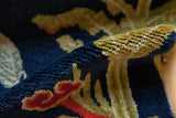 Dense, even pile and intact side cord selvage of a hand-knotted vintage Peking rug.