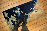 Hand knotted vintage Peking rug runner with pictorial birds, deer, and foliage on indigo.