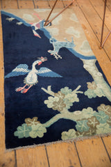 Hand knotted pictorial Peking runner with green foliage motif and natural fringe.