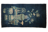 Antique Chinese Peking rug with pictorial design of vases, dragon, plants, indigo and ivory.