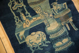 Antique Chinese Peking rug detail: celadon, indigo, ivory fishbowl and vase motifs.