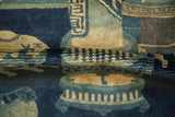 Folded edge of antique Peking rug, revealing even hand-knotted pile in celadon and indigo.