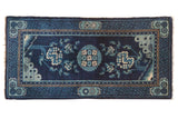Antique Chinese Peking rug runner; indigo, cobalt, ivory medallion, mirrored trees, lightning spandrels.