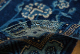 Even pile texture of the antique Peking runner, with indigo, cobalt, and antique ivory tones.