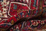 The full, even wool pile and dense hand-knotted texture of a vintage Persian rug.