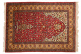 Vintage Romanian rug with a unidirectional tree of life and millefleur design on a cherry red field.