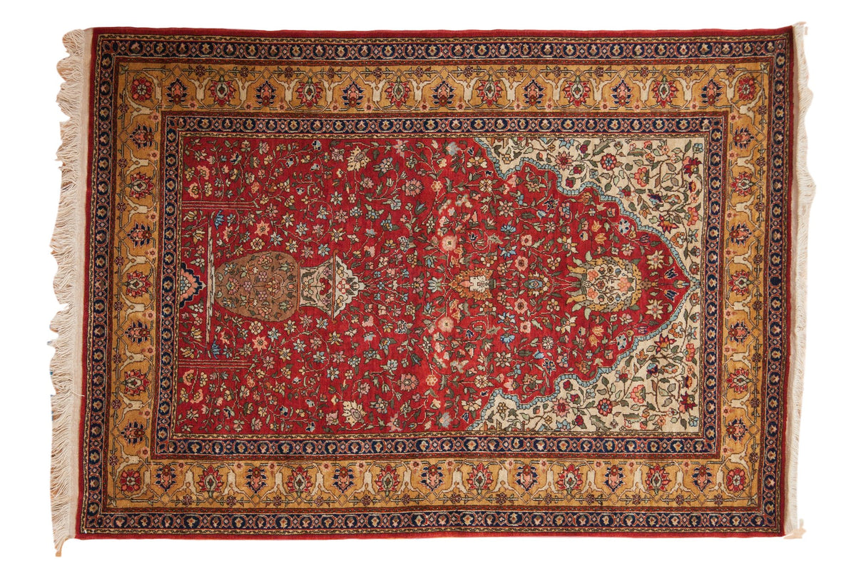 Vintage Romanian Hereke design rug with a cherry red Tree of Life motif, ivory spandrels, and a sand floral border.