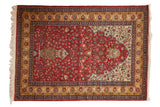 Vintage Romanian Hereke design rug with a cherry red Tree of Life motif, ivory spandrels, and a sand floral border.