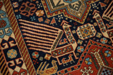 Detail of a large-scale bird with finned feathers on a vintage hand-knotted Romanian rug.