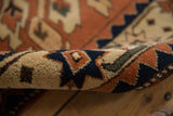 Thick, full hand-knotted pile and geometric diamond motif on a vintage Romanian rug border.