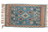 Vintage Turkish Kilim rug, sky blue field with apricot, green, ivory geometric multi-medallion design, 3'8