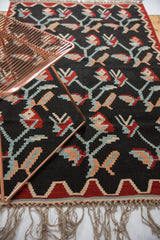 Vintage Turkish Kilim's germinating plant motif in charcoal, wine red, powder blue, apricot blush.