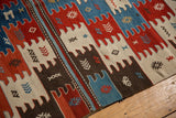 Vintage Turkish Kilim rug corner, natural dye geometric panels and arrowed floral motifs.