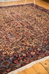 Vintage Mehrivan rug's plush pile and dense allover pattern seen from an angle.