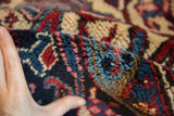 Thick, original full wool pile of the vintage Persian Mehrivan carpet.