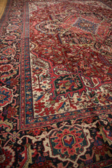 Angled view across the full, plush pile of a vintage Ahar carpet.