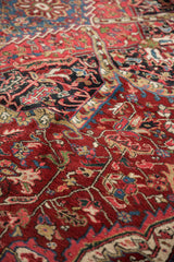 Dense, full pile of a vintage Ahar carpet showing intricate floral and geometric details.