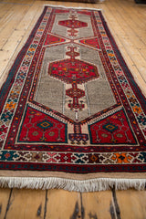 Clean ivory fringe and colorful geometric lower border of the vintage Serab runner.