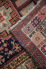 The original side cord selvage and woven back of a vintage Persian Ardebil rug runner.