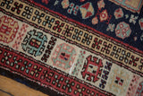 Plush texture of geometric borders on a hand-knotted vintage Ardebil runner.