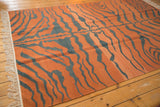 Hand woven pictorial tiger stripe kilim with natural rust and dusty teal abrashes.